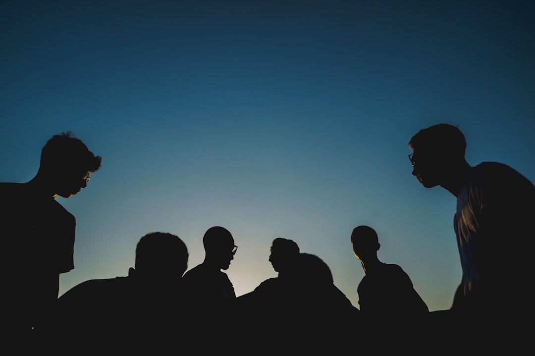 When Selfishness Meets Altruism: How Group Survival Shapes Behavior